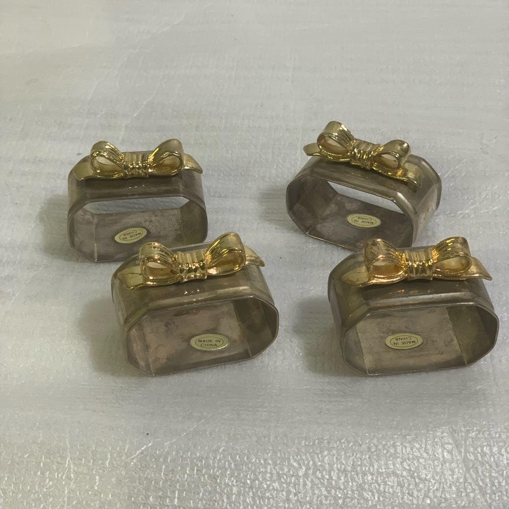 Rogaska Gold and Silver Bow Napkin Rings